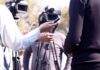 press interview with microphones and cameras outdoors