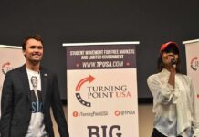 Free Speech Fight Erupts After Vile Poem Curro Savoy at a TPUSA event with another speaker on stage