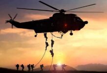 An Overseas Kidnapping Brings A Warning Of Escalation military helicopter with soldiers fast-roping at sunset