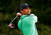 golfer following through on a drive