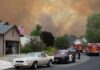 Minutes Lost, Homes Burned – Who Failed? Emergency vehicles respond to wildfire near suburban homes