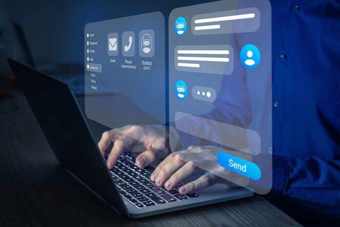 shutterstock_2143155369 Hands typing on laptop with chatbot interface overlay