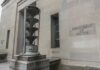 Department of Justice building exterior with sculptural fountain