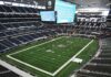 NFL Power Play: Jay-Z Crowns Himself American football stadium interior with large central video board
